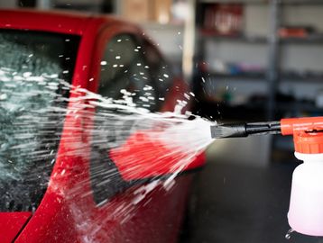 Professional car detailing foam wash